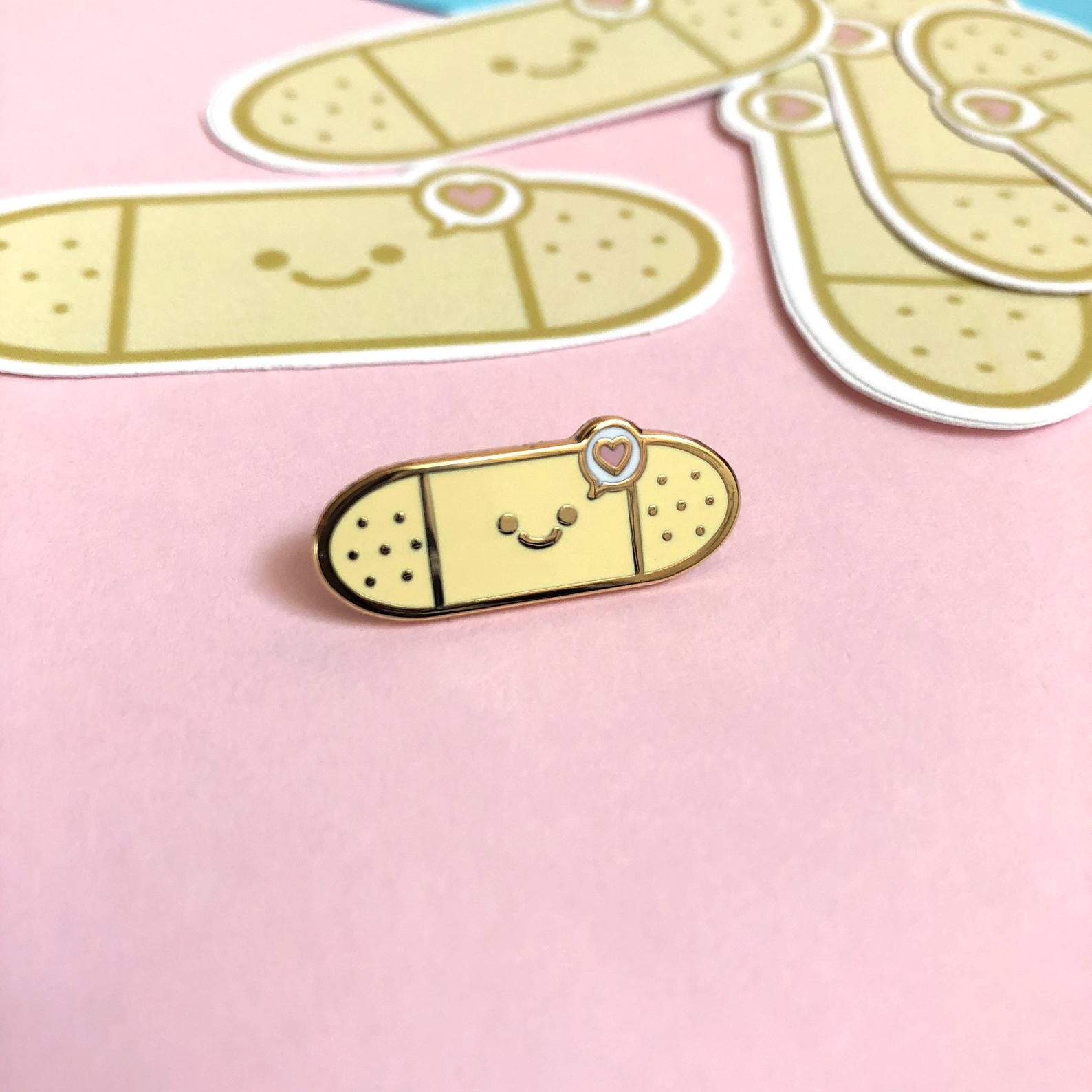 bandaid enamel pin